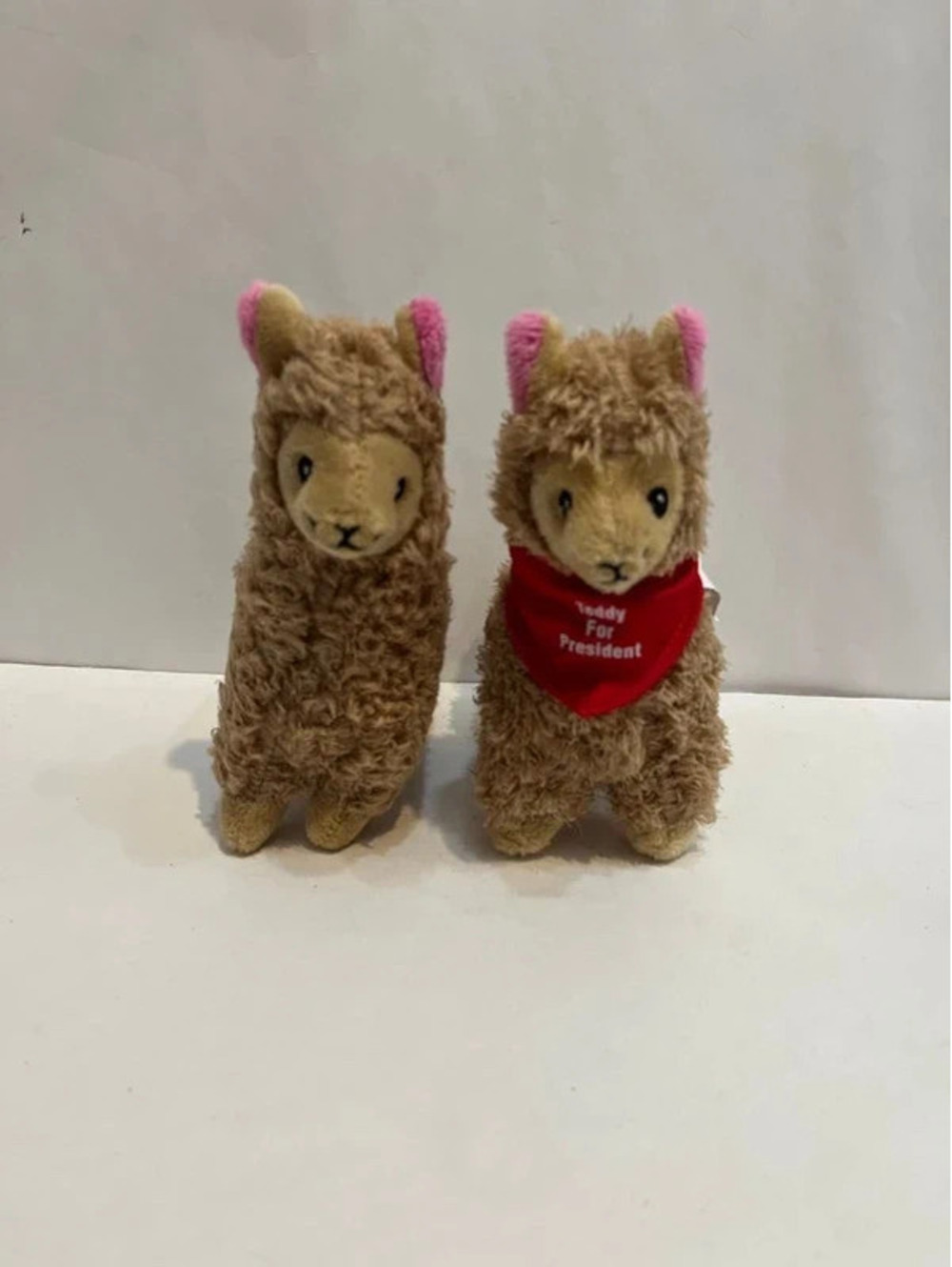 2 boy and girl llama plush toys